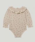 Body beige con olan y flores