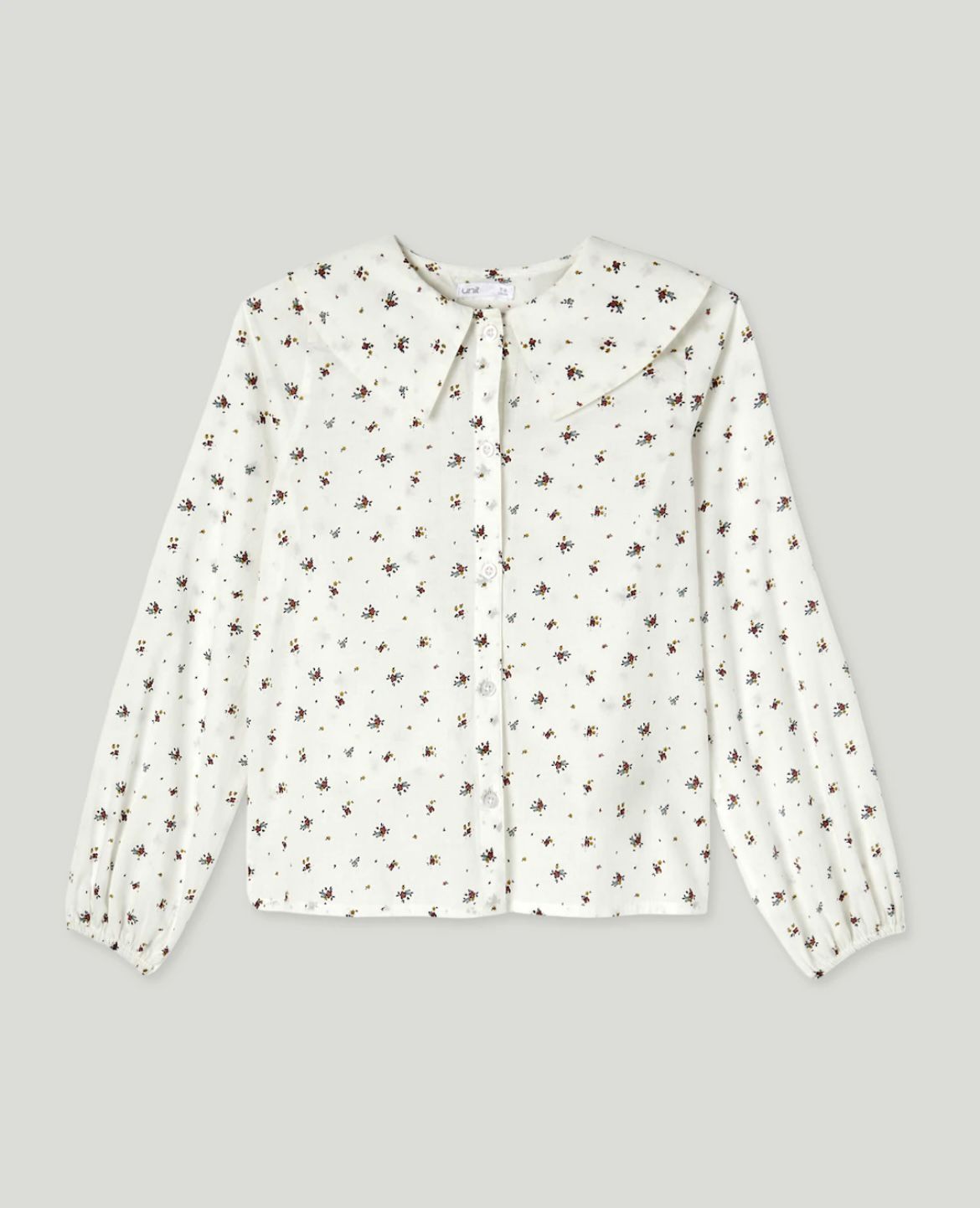 Blusa blanca de flores