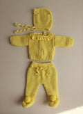 Conjunto amarillo cuello olan primera puesta